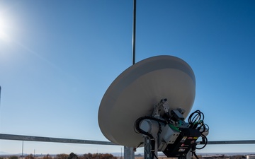 MILSTAR satellite sits atop trestle structure