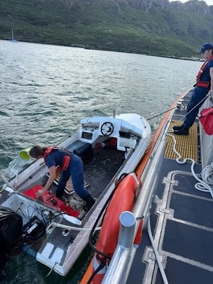 Coast Guard rescues father, sons after boat capsizes south of Lanai