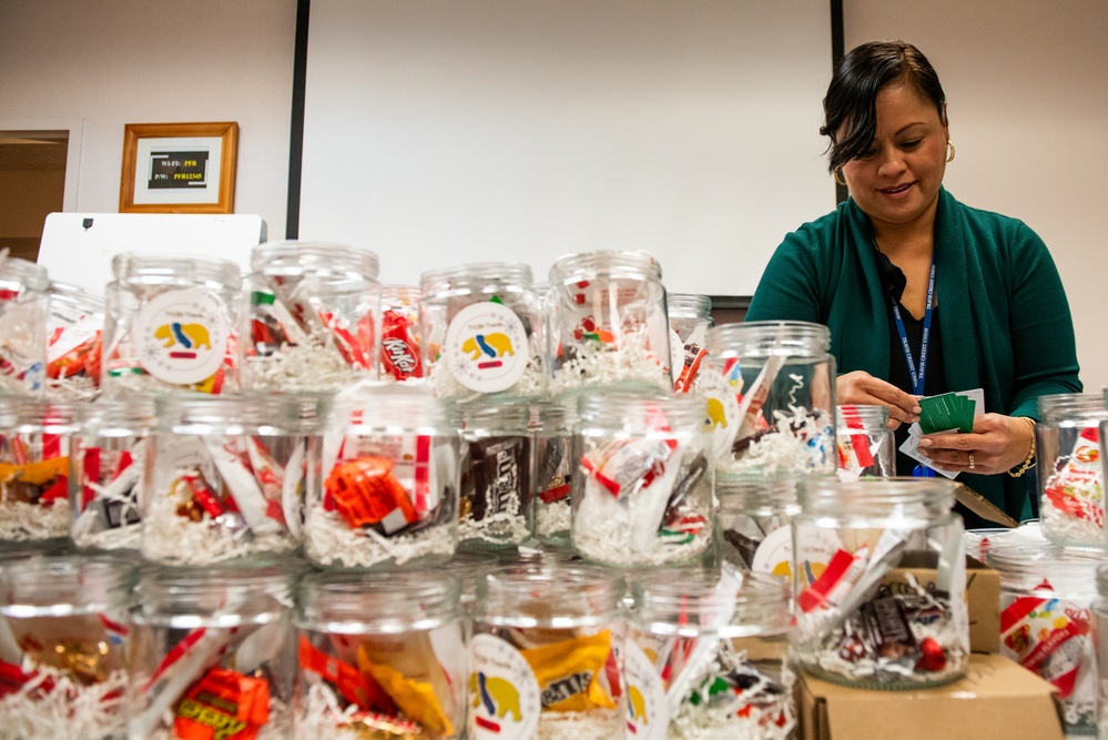 Building holiday magic: Team Travis gears up for Holiday Dorm Drop