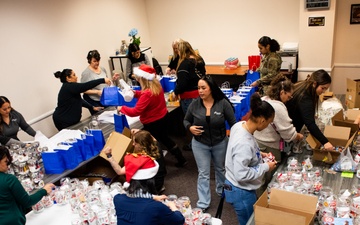 Building holiday magic: Team Travis gears up for Holiday Dorm Drop