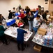 Building holiday magic: Team Travis gears up for Holiday Dorm Drop