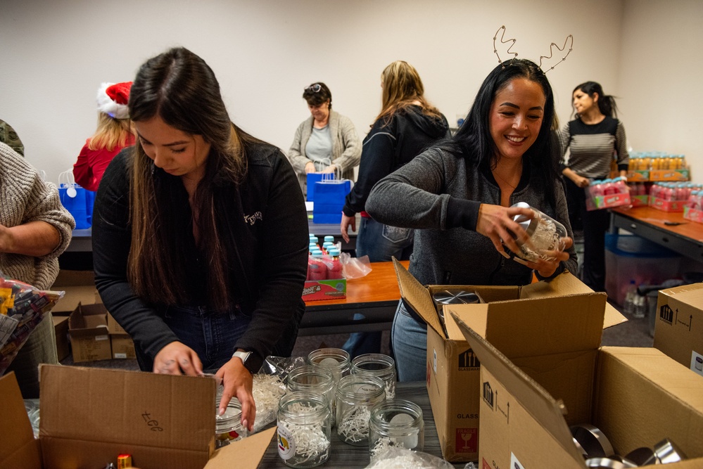 Building holiday magic: Team Travis gears up for Holiday Dorm Drop