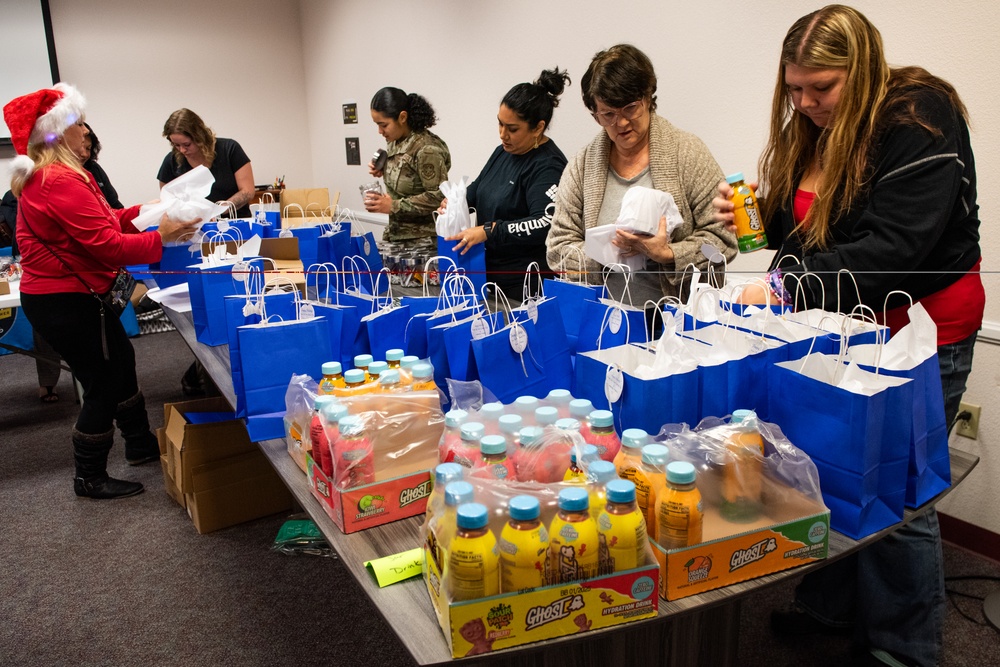 Building holiday magic: Team Travis gears up for Holiday Dorm Drop