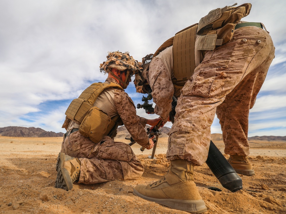U.S. Marines with 2nd Battalion, 23rd Marine Regiment, fire mortars during training for upcoming deployment
