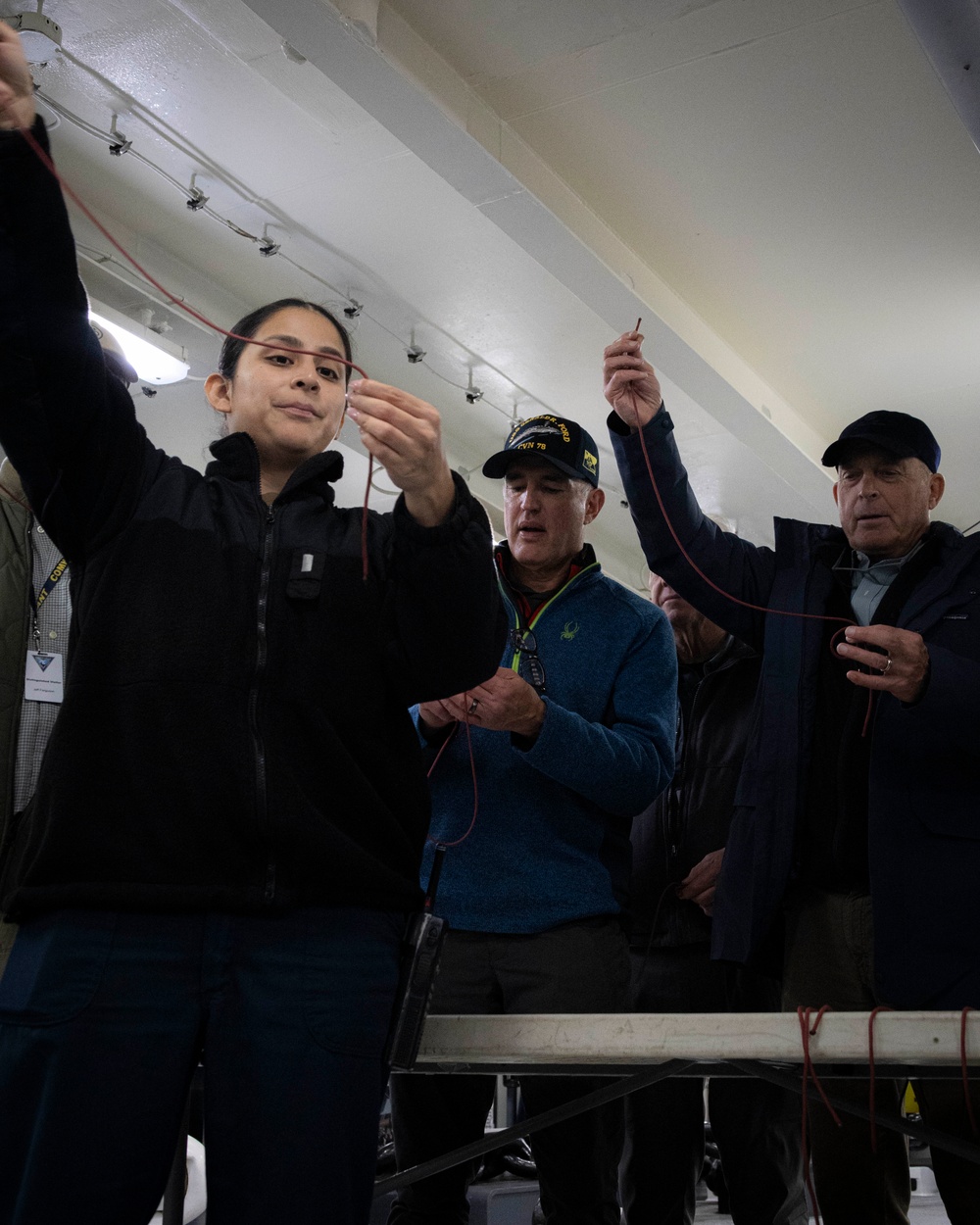 Distinguished Visitors tie lines aboard USS Gerald R. Ford (CVN 78)