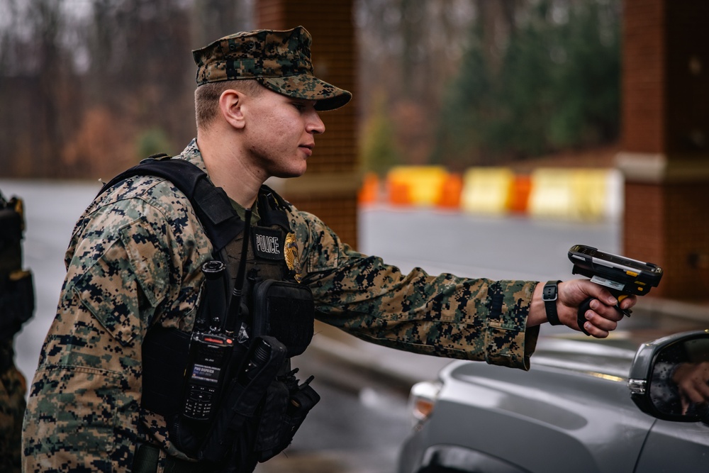 Military Police Officers stand guard at MCBQ