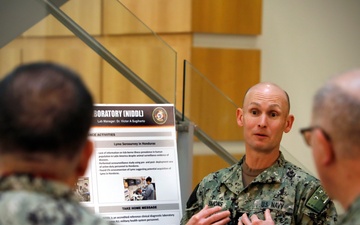 Rear Adm. Case Visits NMRC