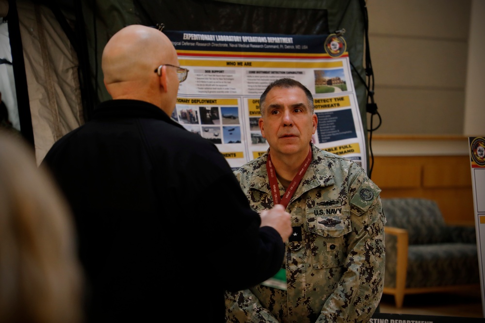 Rear Adm. Case Visits NMRC