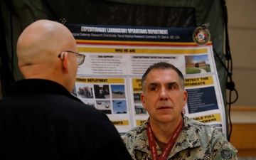 Rear Adm. Case Visits NMRC