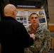 Rear Adm. Case Visits NMRC