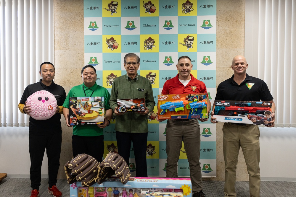 U.S. Marine Corps gives gifts to the city of Yaese through Merry Marine Toy Drive.