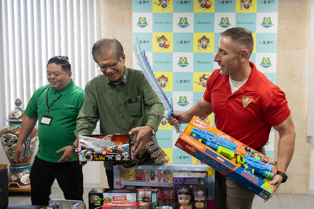 U.S. Marine Corps gives gifts to the city of Yaese through Merry Marine Toy Drive.