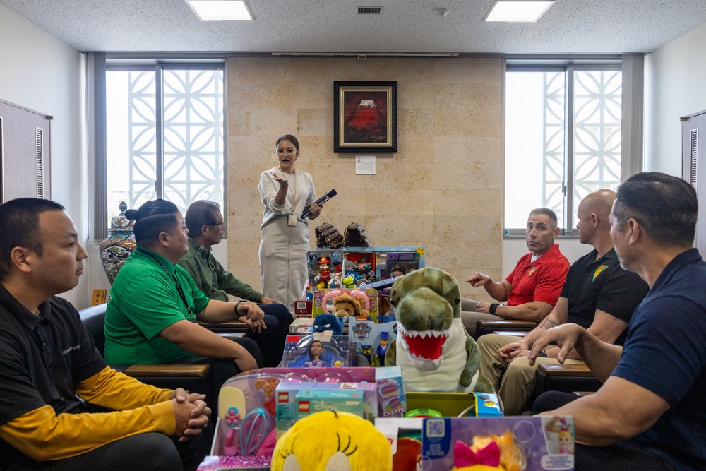 U.S. Marine Corps gives gifts to the city of Yaese through Merry Marine Toy Drive.