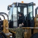 Japanese forces assist U.S. Marines with transporting equipment