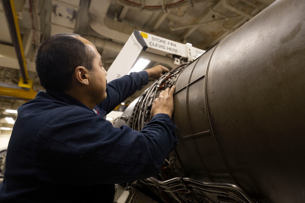 USS Gerald R. Ford (CVN 78) Sailor conducts engine maintenance