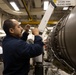 USS Gerald R. Ford (CVN 78) Sailor conducts engine maintenance