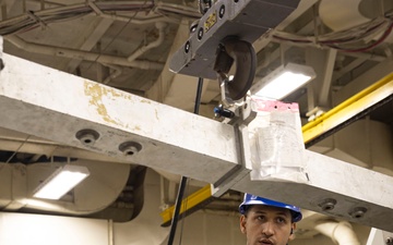 USS Gerald R. Ford (CVN 78) Sailor conducts engine maintenance