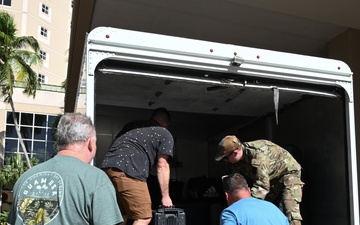 117th ARW and 99th ARS returning deployers help with Bag Drag