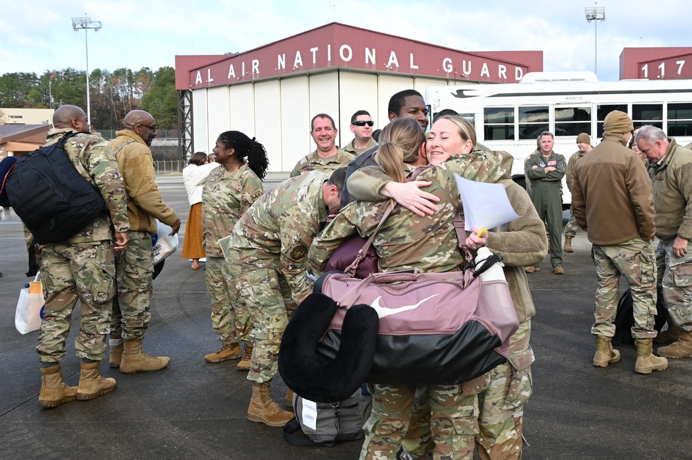 Returning deployers are welcomed home by friends and family