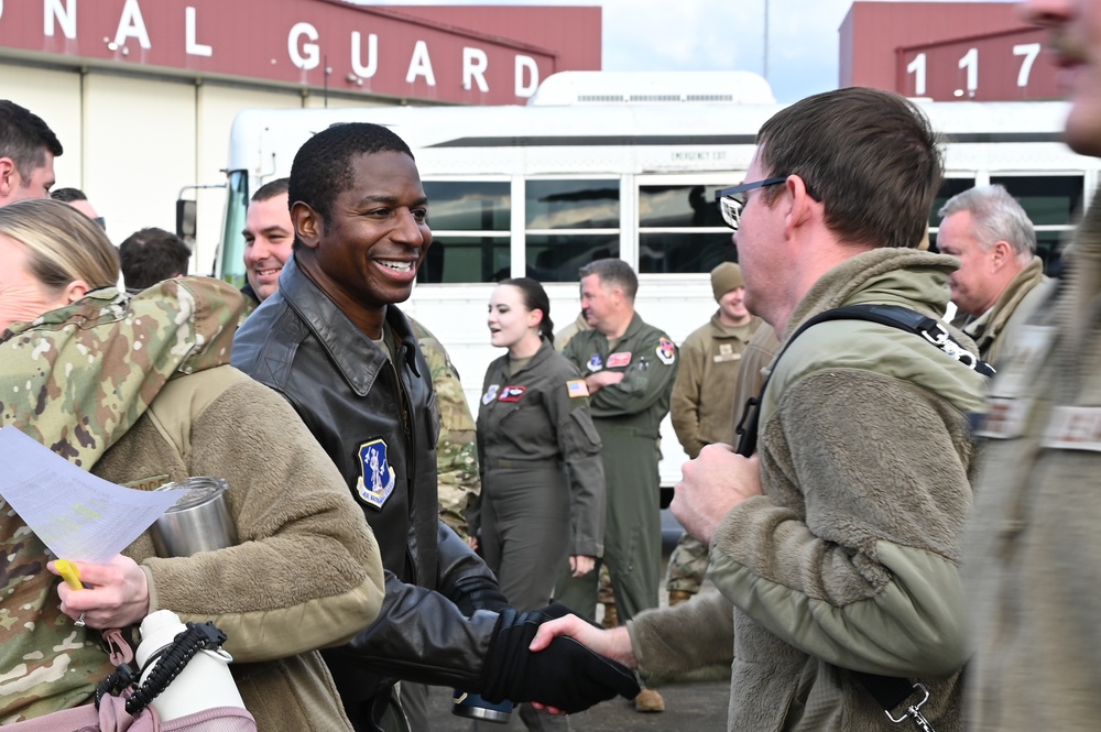 Returning deployers are welcomed home by friends and family