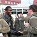 Returning deployers are welcomed home by friends and family