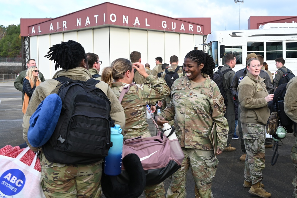 Returning deployers are welcomed home by friends and family