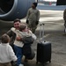 Returning deployers are welcomed home by friends and family