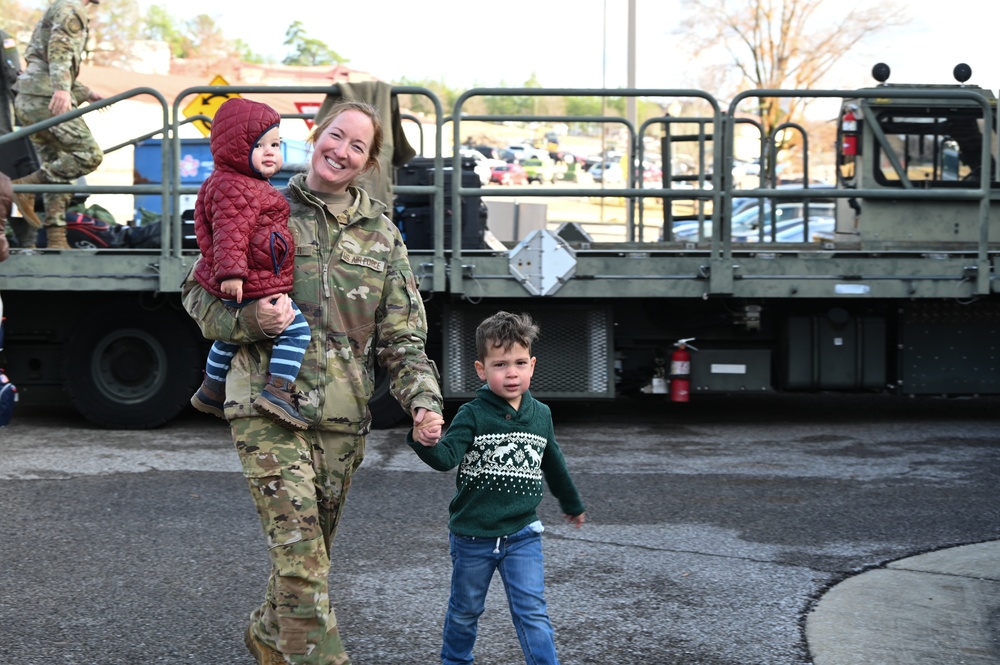 Returning deployers are welcomed home by friends and family