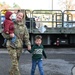 Returning deployers are welcomed home by friends and family