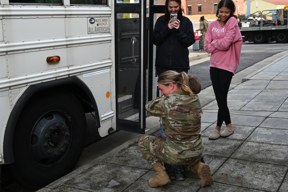 Returning deployers are welcomed home by friends and family