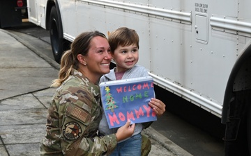 Returning deployers are welcomed home by friends and family