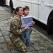 Returning deployers are welcomed home by friends and family