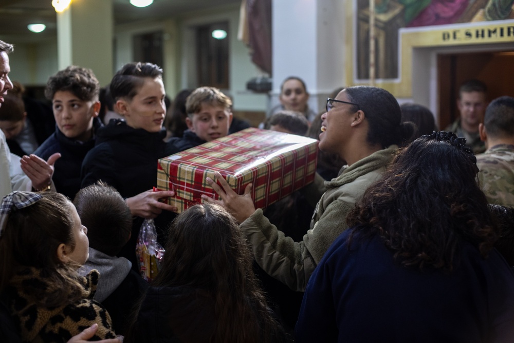 U.S. Soldiers Deliver Gifts to St. Joseph Church in Kosovo