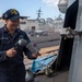 USS Spruance Sailors conduct paint preservation