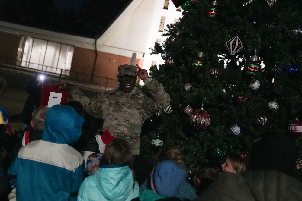 Col. Deedrick Reese, Robins Installation and 78th Air Base Wing commander, orders the countdown Team Robins children before flipping the switch to light the base tree.