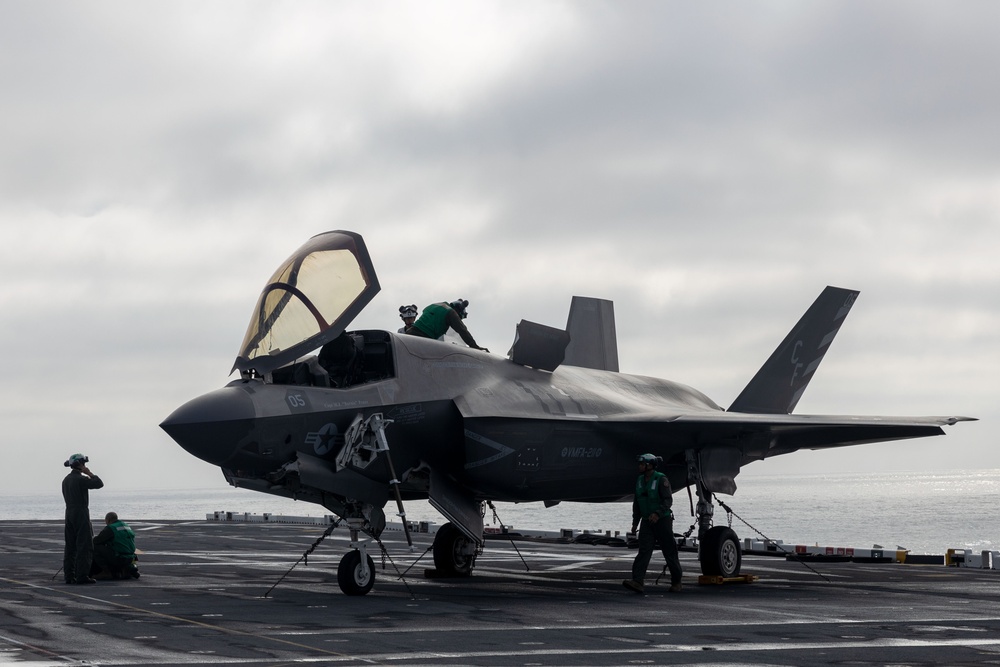 Steel Knight 24: VMFA-211 performs maintenance on the flight deck