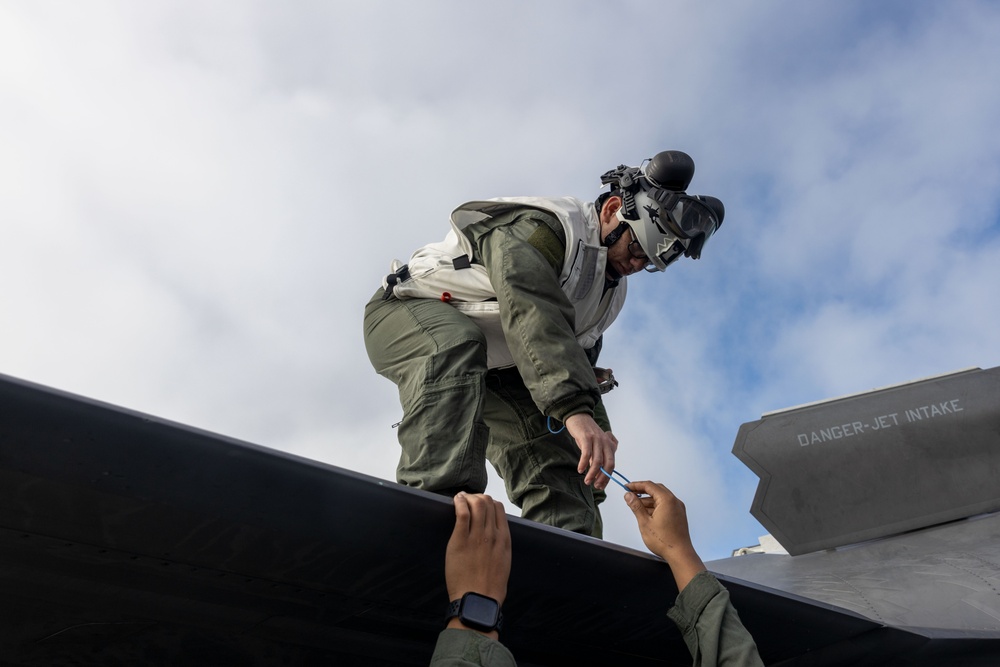 Steel Knight 24: VMFA-211 performs maintenance on the flight deck
