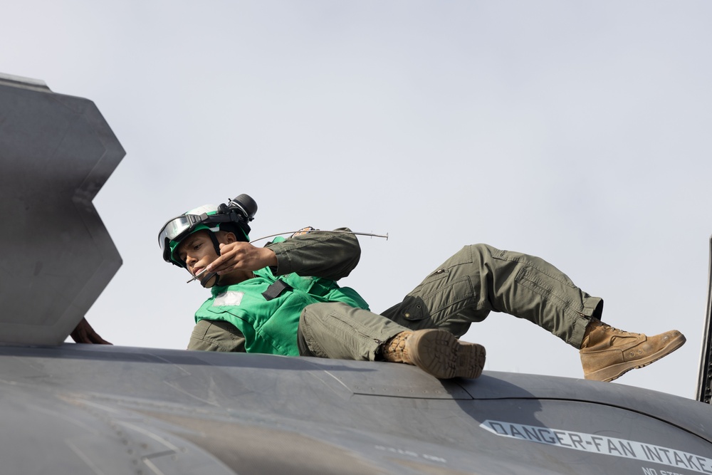 Steel Knight 24: VMFA-211 performs maintenance on the flight deck