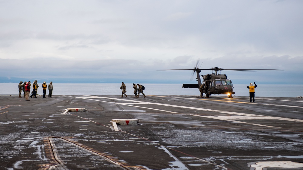 USS Ronald Reagan (CVN 76) conducts joint flight deck operations with the U.S. Army
