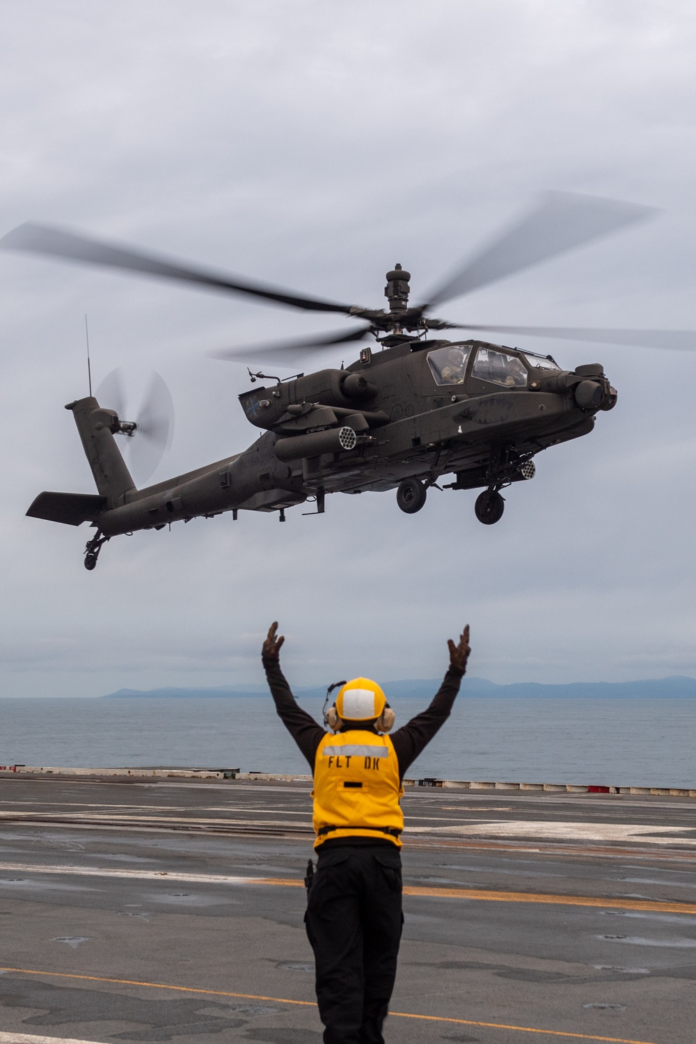 USS Ronald Reagan (CVN 76) conducts joint flight deck operations with the U.S. Army