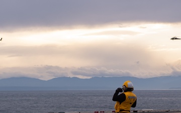 USS Ronald Reagan (CVN 76) conducts joint flight deck operations with the U.S. Army