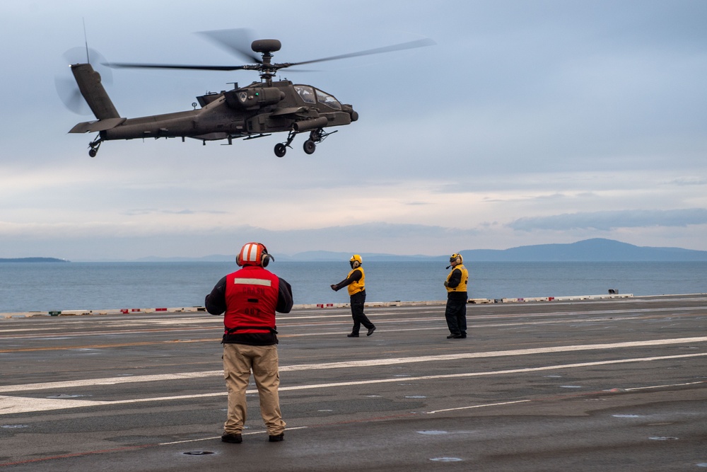 USS Ronald Reagan (CVN 76) conducts joint flight deck operations with the U.S. Army