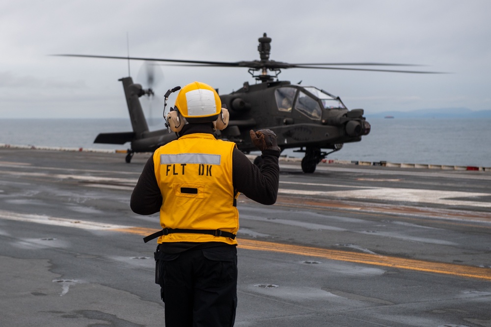 USS Ronald Reagan (CVN 76) conducts joint flight deck operations with the U.S. Army