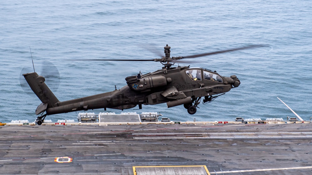 USS Ronald Reagan (CVN 76) conducts joint flight deck operations with the U.S. Army