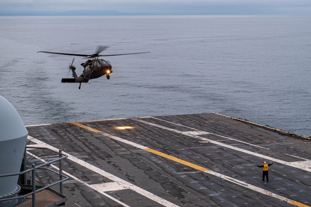 USS Ronald Reagan (CVN 76) conducts joint flight deck operations with the U.S. Army