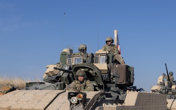 Coalition Forces Depart in a Bradley Fighting Vehicle Convoy in Syria