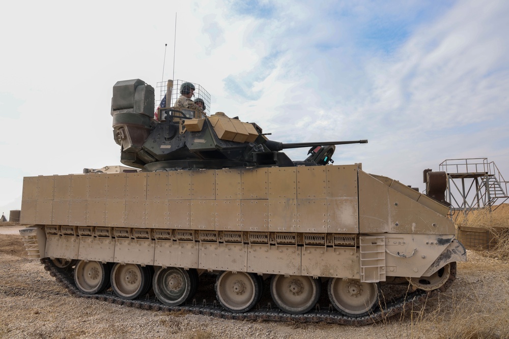 Coalition Forces Secure Perimeter with M2A3 Bradley Fighting Vehicles