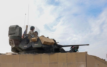 Coalition Forces Secure Perimeter with M2A3 Bradley Fighting Vehicles