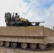 Coalition Forces Secure Perimeter with M2A3 Bradley Fighting Vehicles