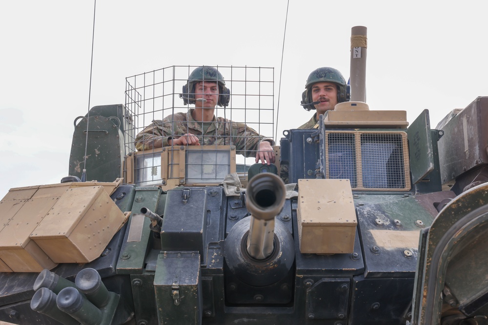 Coalition Forces Secure Perimeter with M2A3 Bradley Fighting Vehicles